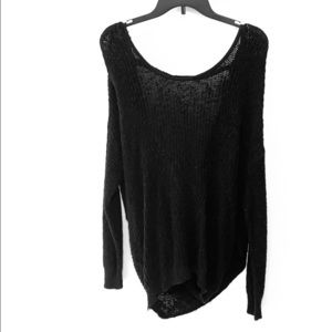 Woman’s open back sweater